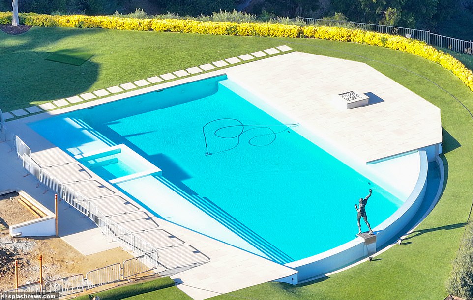Some things never change: One thing she hasn't changed is a statue of Stallone, Rocky's character from the 1976 American sports drama, which overlooks a large outdoor swimming pool in the backyard.